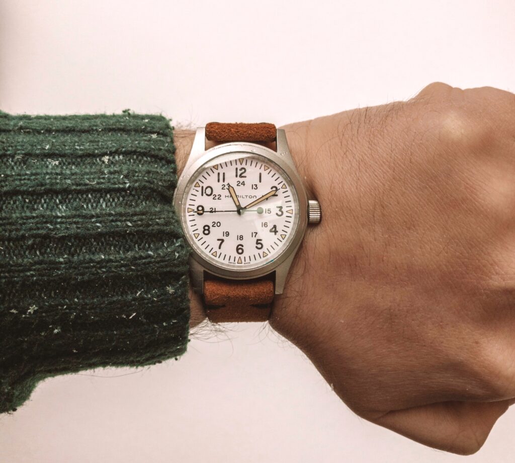 An image of Hamilton Field Khaki Mechanical Watch worn on a wrist.